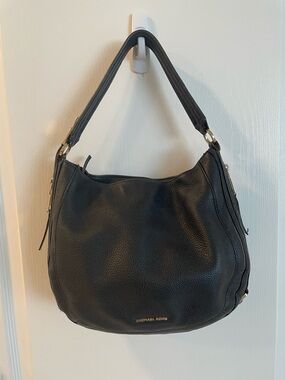 Michael Kors Lydia Black Pebbled Leather Hobo with Gold Hardware.